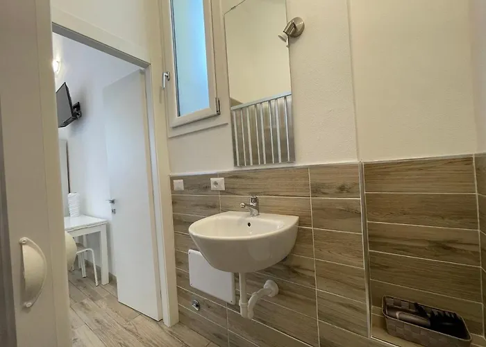 White Shell Self Check-in 招待所 阿尔盖罗